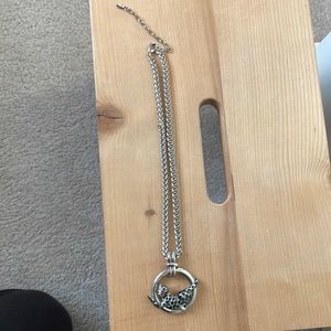 Silver tone leopard necklace.